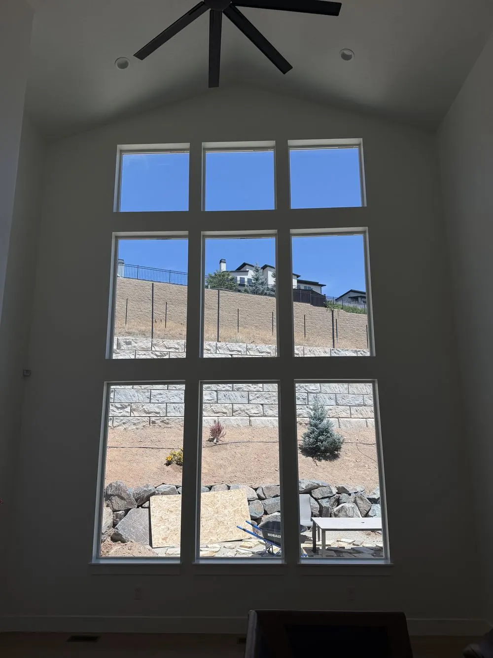 Tall residential windows keeping natural light after film installation